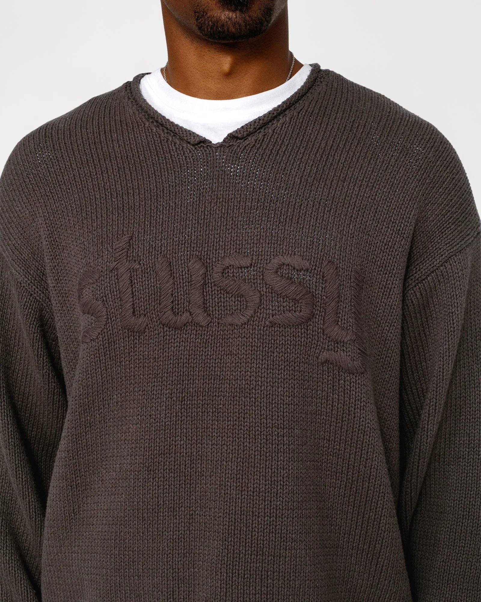 EMBROIDERED V-NECK LOGO SWEATER